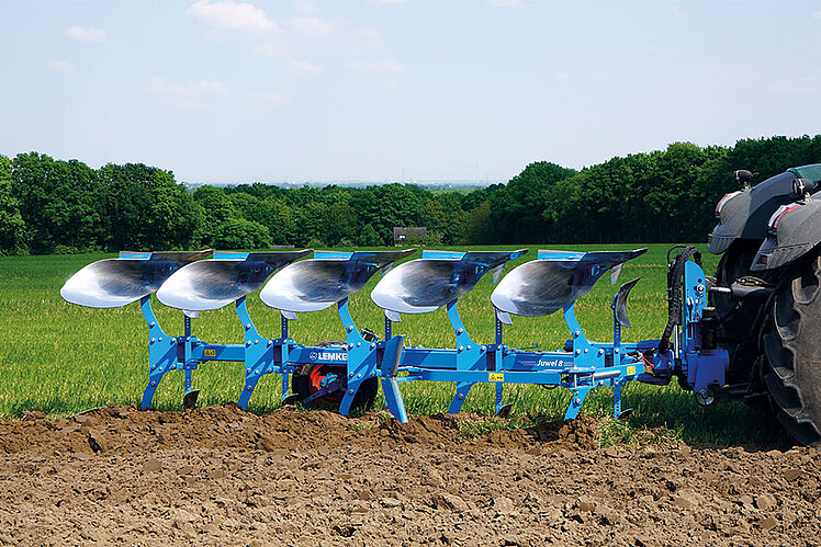 Mounted ploughs